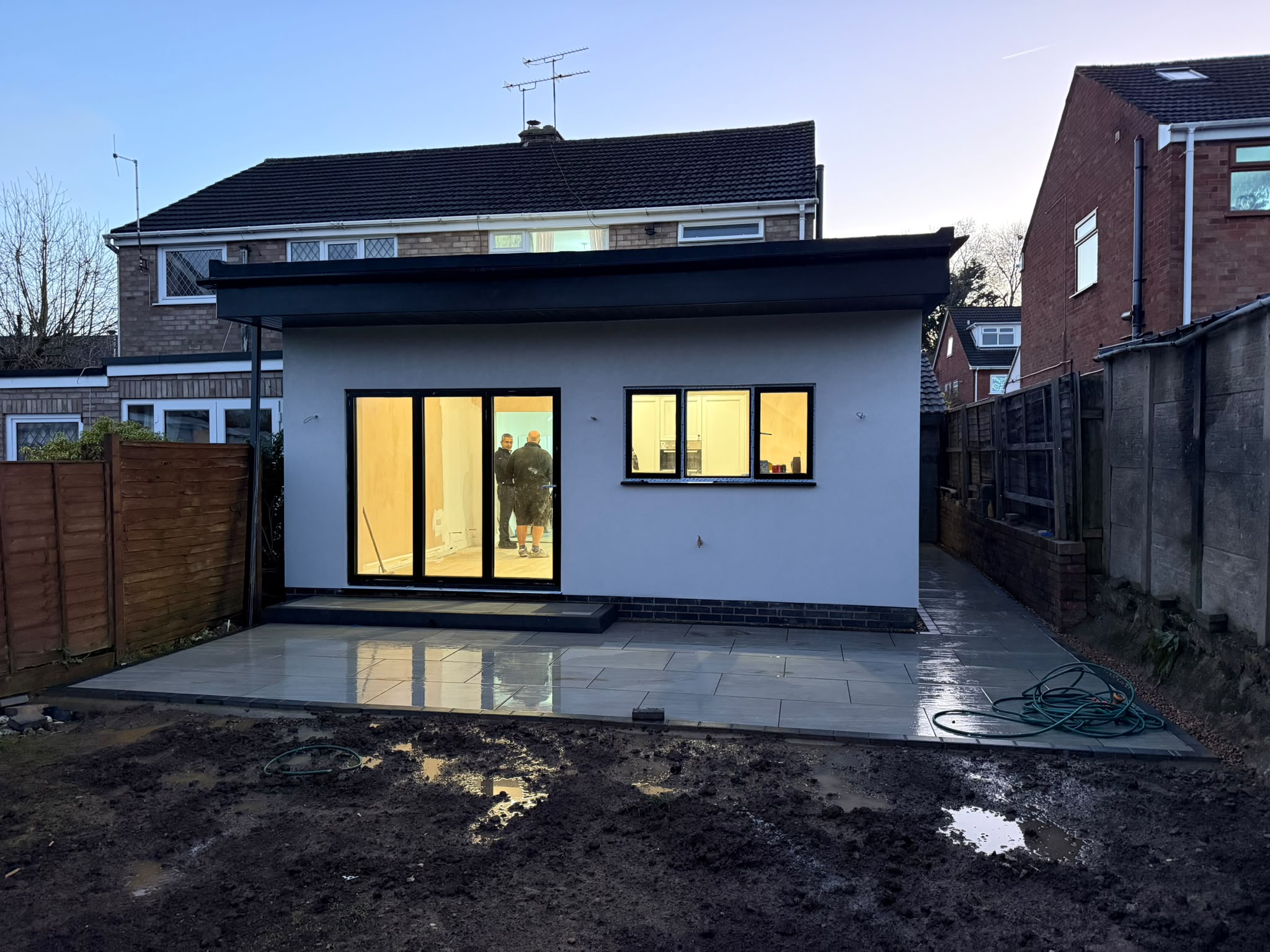 Extension exterior · Adjacent ground before landscaping